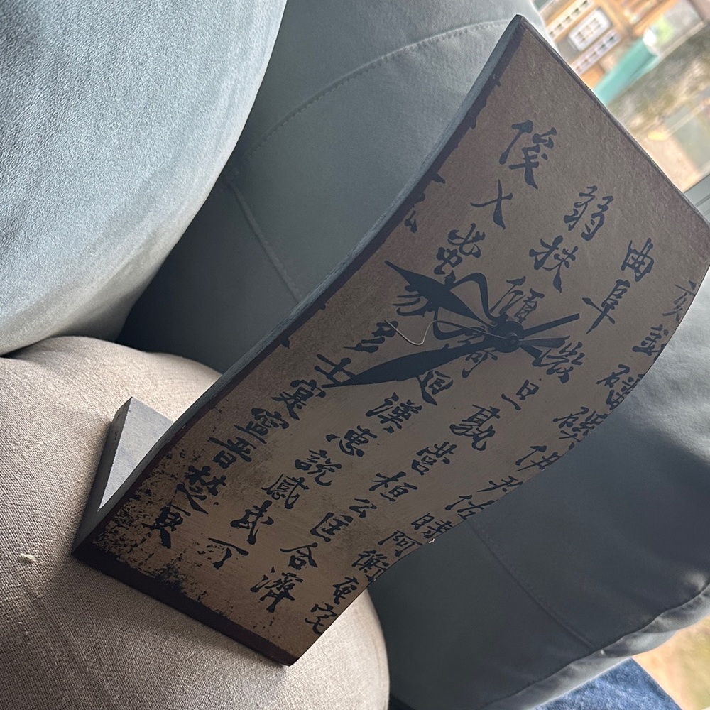 Decorative Curved Panel Clock with Asian Script